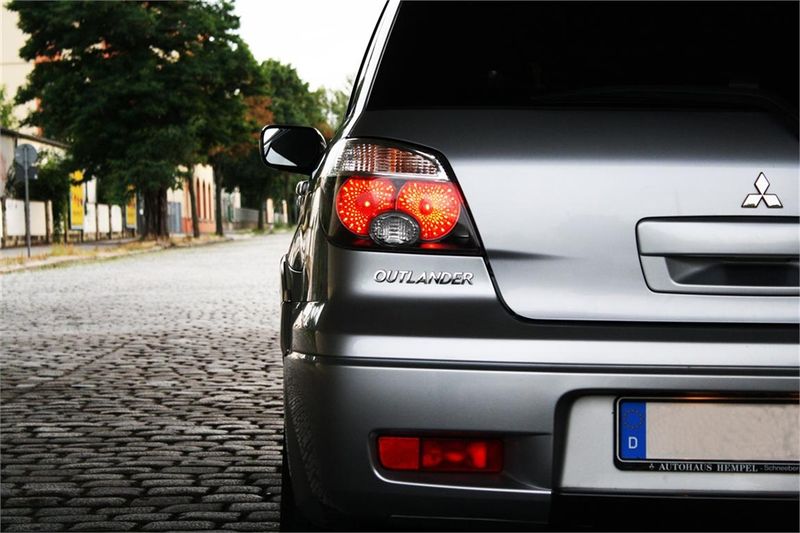 Datei:Mitsubishi Outlander CU0W Facelift Heck.jpg
